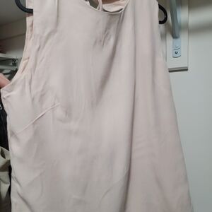 Chic Sleeveless Blouse in Soft Cream